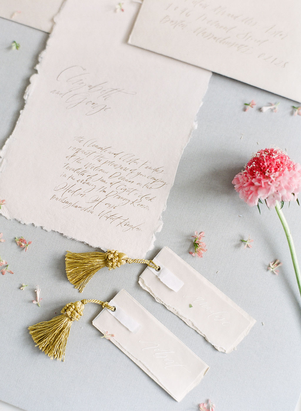 Wedding invites made from handmade paper with calligraphy