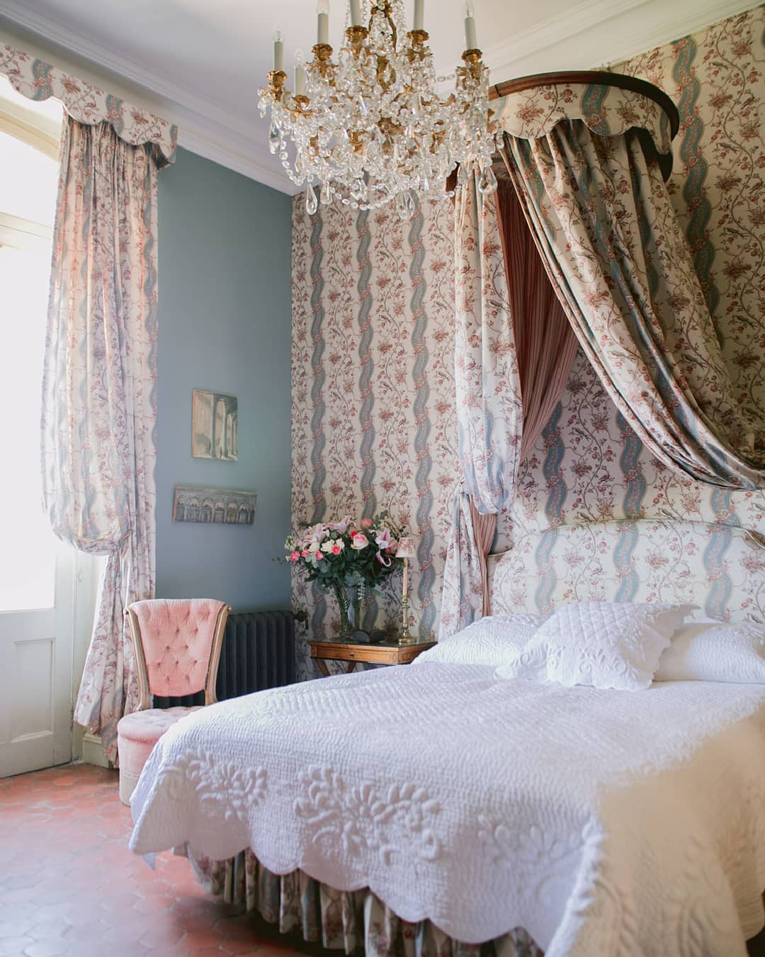 French chateau room with custom motif and canopy bed