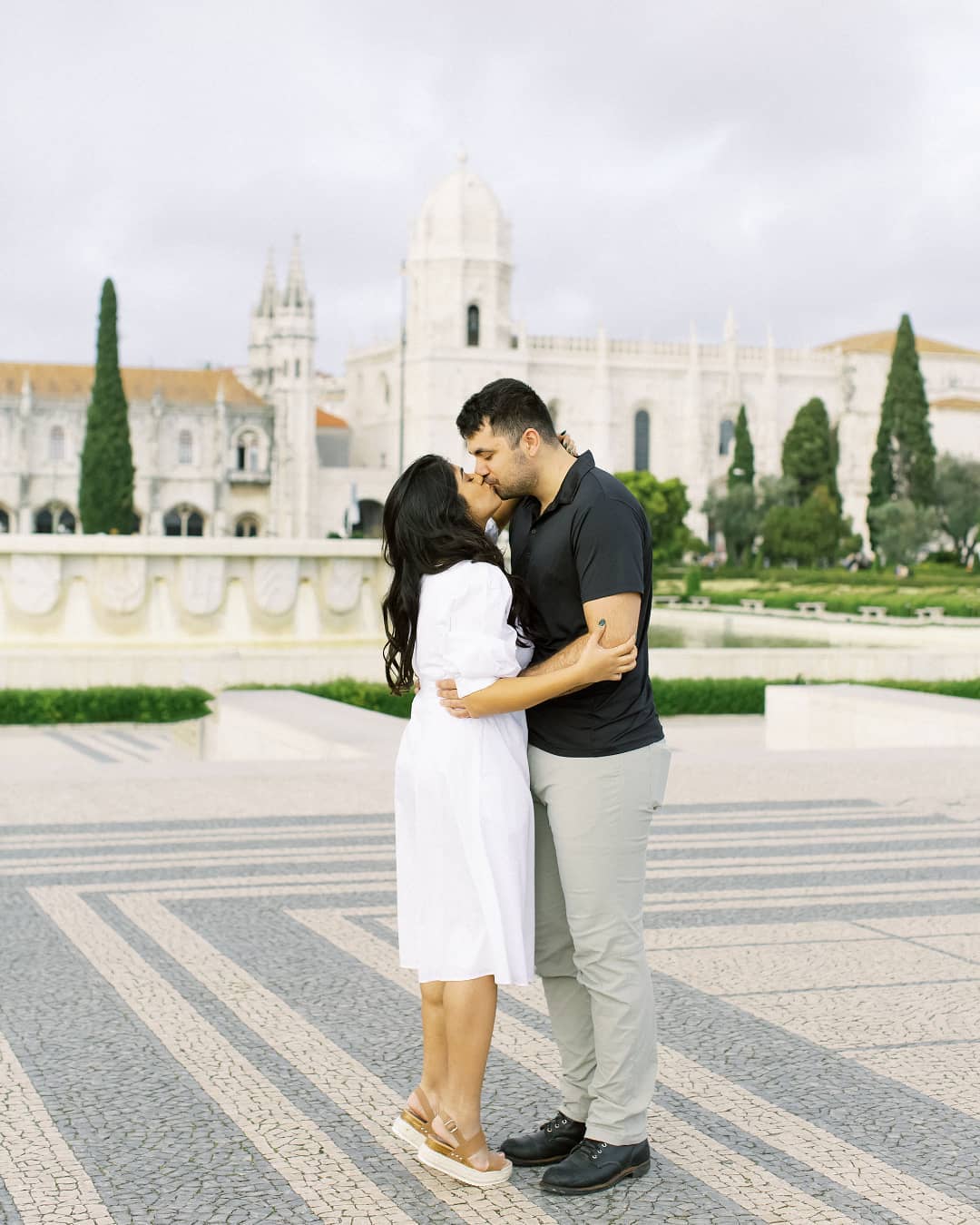 Bride and groom to be sharing a kiss during their engagement session in Portugal