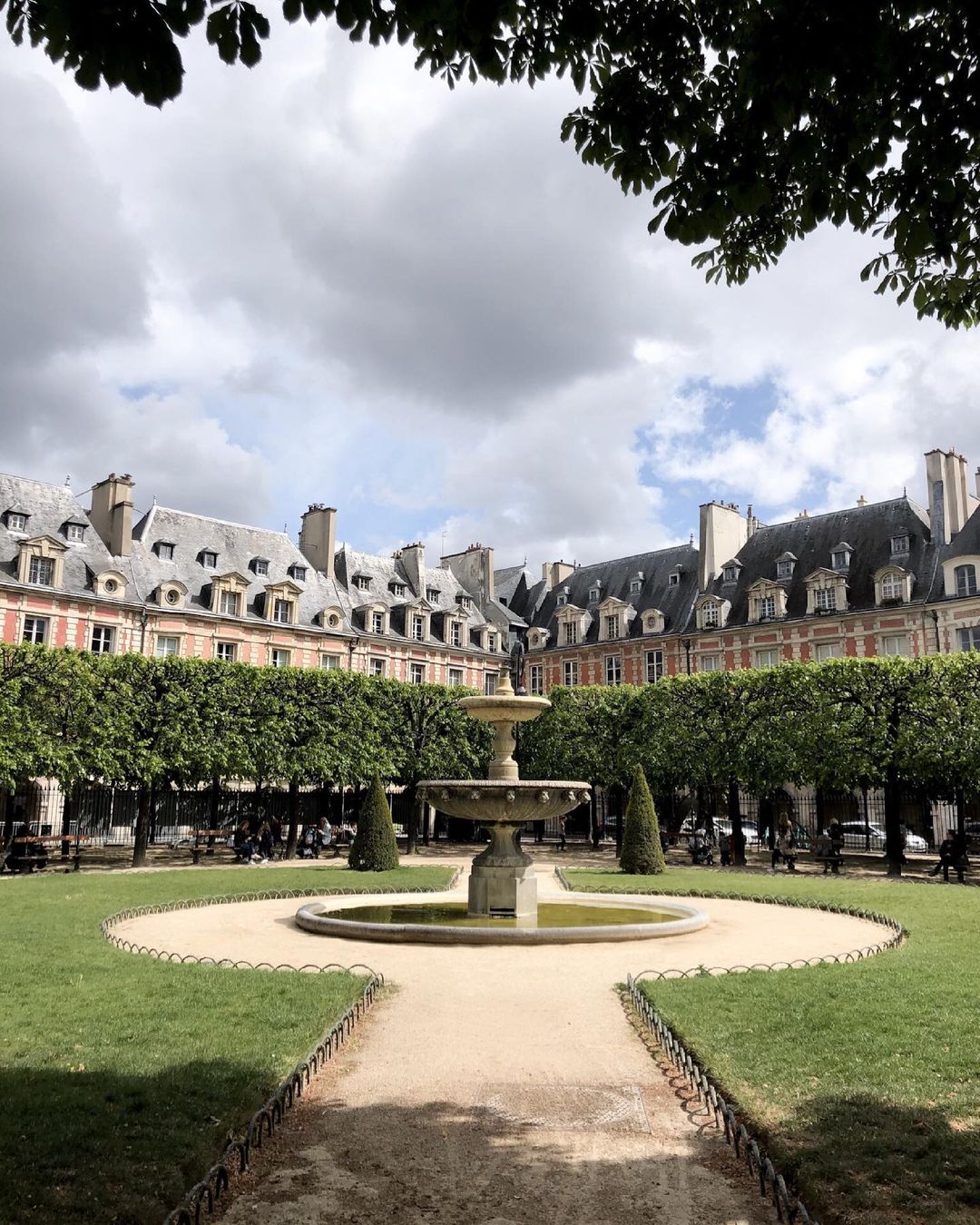 One of the corner fountains in Place des Vosges