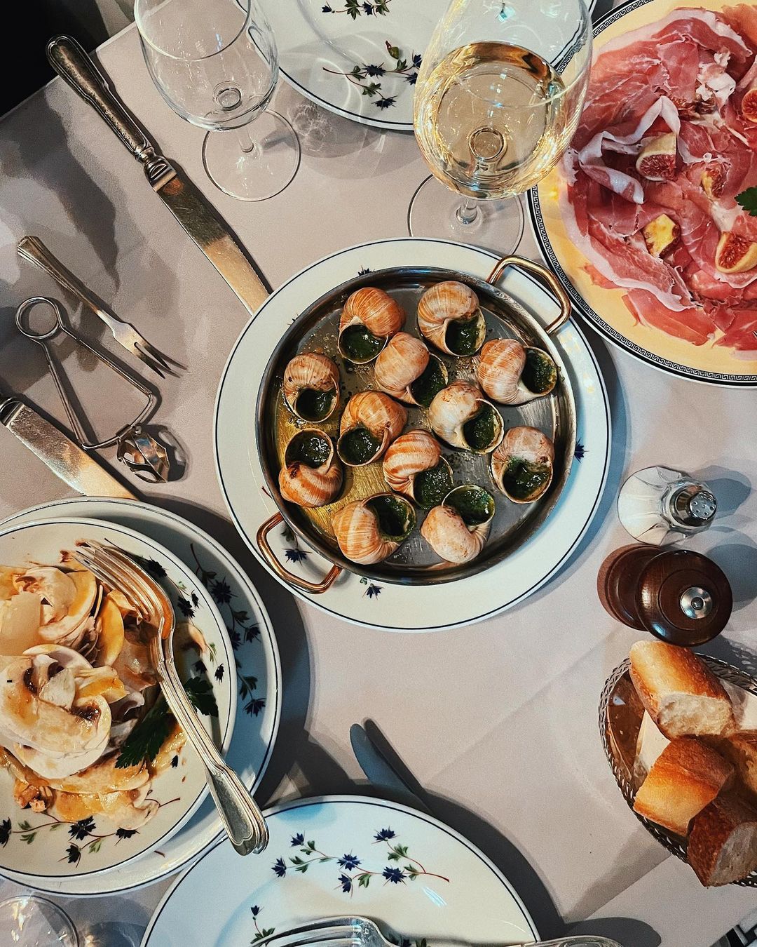 Escargots and Iberica ham at Le Voltaire